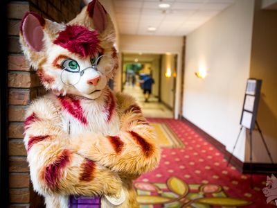 Manicknux posing in a hallway